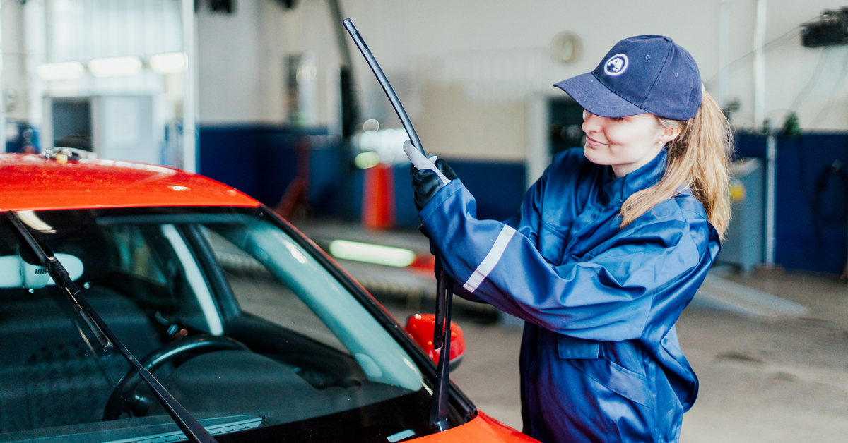 A new wiper blade is being installed at an A-Katsastus service point.